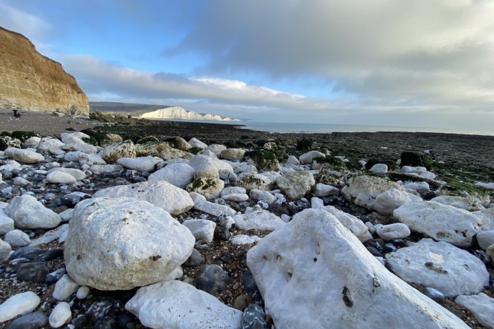 Rock pools with cliffs in the background